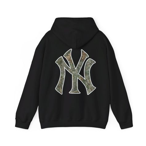 Camo New York Yankees Hoodie, Y2K Sweatshirt, Trendy Unisex Clothes, NY Yankees Clothes, Aesthetic Oversized Sweatshirt, Trendy Streetwear, Camo Sweatshirt, Women's Street Style Clothes ⭐️ The model in the photo is typically an adult small/medium but is wearing an XL for the oversized look ⭐️ This item is made to order. Orders can only be canceled and changed up to 24 hrs after they have been placed. ⭐️ Items can only be returned/exchanged if they arrive damaged or are lost in the mail. Please carefully read sizing chart before purchasing. ⭐️ If you have any questions or want a custom order feel free to message me! This unisex heavy blend hooded sweatshirt is relaxation itself. Made with a thick blend of cotton and polyester, it feels plush, soft and warm, a perfect choice for any cold day Yankee Hoodie, Yankees Hoodie, Y2k Sweatshirt, Hoodie Y2k, Camo Sweatshirt, Sweatshirt Trendy, Unisex Clothes, Xmas List, Trendy Streetwear