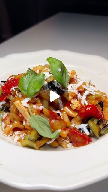 Giovanni Siracusa on Instagram: "✨ Save this Recipe!  🍝 **Pasta alla Norma for 2** 🍝  🌟 **Ingredients:** - 7 oz Pasta (Riccioli or Casareccia) - 1 Eggplant - Ricotta Salata (to taste) - 1 Can Cherry Tomatoes  - 4 Cloves Garlic - 1 Peperoncino (Italian hot chili pepper) - Olive Oil - Fresh Basil - Salt (to taste)  👨‍🍳 **Directions:**  1. **Eggplant Prep:** Cut the eggplant into cubes and fry in olive oil until golden and crispy. Transfer to a paper towel-lined plate to drain excess oil. Sprinkle with salt.  2. **Sauce Time:** Crush the garlic cloves and sauté with olive oil and the peperoncino in a pan. Add the cherry tomatoes (crushed), a handful of fresh basil, and salt to your liking. Let it simmer to blend the flavors.  3. **Pasta Perfect:** In salted boiling water, cook the pasta Can Cherry Tomatoes, Norma Pasta, Eggplant Ricotta, Canning Cherry Tomatoes, Basil Salt, Pasta Alla Norma, Recipe Pasta, Italian Foods, Hottest Chili Pepper