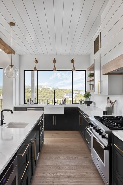 cliffside-farmhouse-cate-black-photo-fireplace | Portfolio (Project Name) Kitchen With Large Windows, Modular Farmhouse, Architectural Kitchen, Light Hardwood Floors, Oak Wood Floors, Black Kitchen Cabinets, Light Wood Floors, White Backsplash, White Shiplap