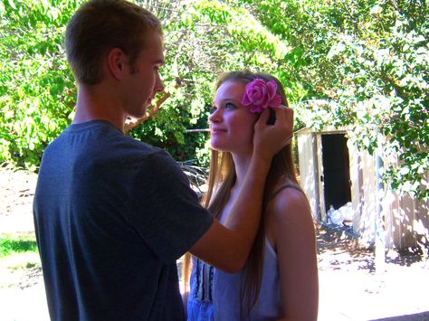 He put the flower in my hair (: .. this is such a cute photo for any cute couple Tying Someones Hair Pose Reference, Flower Tucked Behind Ear, Hair Behind Ears Drawing, Tucking Hair Behind Ear Pose Reference, Tucking Hair Behind Ear Reference, Tucking Hair Behind Ear Pose Drawing, Posing Pictures, Hair References Drawing, Sunrise Photography Nature