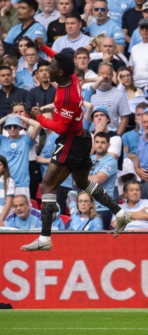 Mainoo celebrates making it 2-0. End result 2-1w against Manchester City, 2024 FA Cup final.