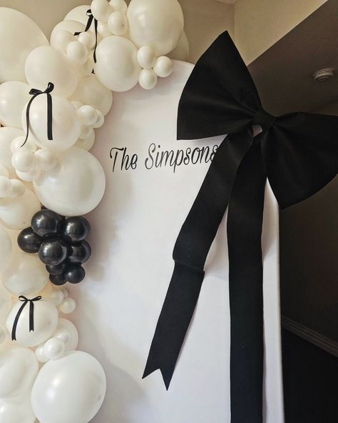 A big celebration for Ashely & Griffin 🥂 Happy wedding weekend! #rehersaldinner #rehersalparty #wedding #weddingweekend #blackandwhiteballoons #balloonsandbows #balloondecore #bows#blackbows #giantbow #bowbackdrop #balloongarland ##balloondecore Black And White Balloon Arch Wedding, Black Bow Balloon Garland, Bow Balloon Decorations, Black And White Party Backdrop, Bow Balloon Arch, Black And White Balloon Garland, Black And White Balloon Arch, Bow Backdrop, Diy Fabric Garland