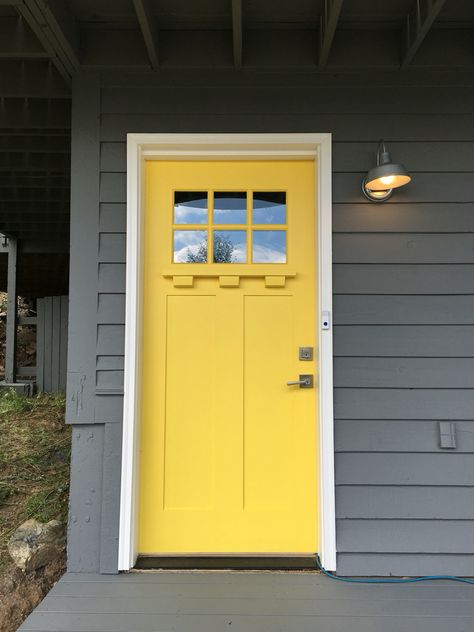 We just painted our house with Sherwin Williams colors and it turned out beautifully!   House: SW2849 Westchester Gray Trim: SW7004 Snowbound Door: SW6902 Decisive Yellow Yellow Front Door, Exterior Gray Paint, Unique Front Doors, Yellow Front Doors, Best Front Doors, Best Exterior Paint, House Paint Color Combination, Front Door Paint Colors, Gray House