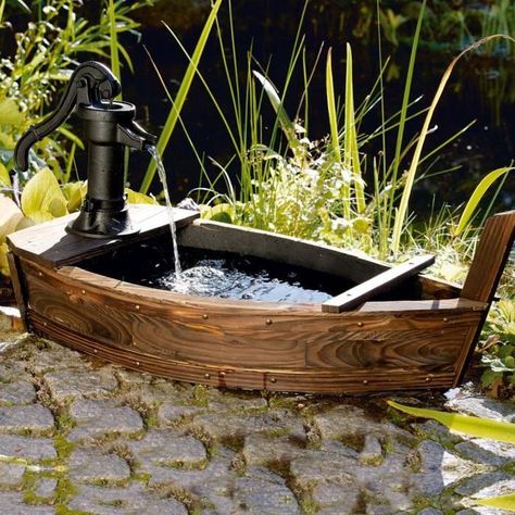 Small space water fountain ideas | Backyard water features | Boat pond water feature. Fountain Boats, Container Water Gardens, Patio Pond, Patio Layout, Pond Water Features, Backyard Water Feature, Water Fountains Outdoor, Water Features In The Garden, Outdoor Flowers