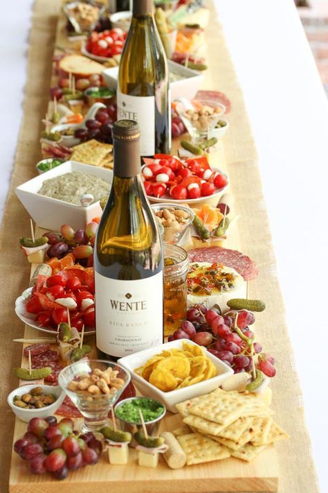 This is an easy tutorial on How to Make an a beautiful Antipasto Board Table Runner. Impress your friends and guests with this beautiful display of your favorite Antipasto foods as it runs down the center of your table on your homemade board. #ad Diy Wine Tasting Board, Dinner Ideas Guests Friends, Italian Graze Table, Tasting Table Ideas, Antipasto Board, Tapas Buffet, Antipasti Board, Tapas Board, Antipasti Platter