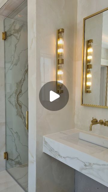 Faye Robinson-Hey on Instagram: "Recently installed luxury master ensuite 🤍 . Our client brief asked for a hotel feel scheme with a clean, modern but luxe aesthetic . . . We extended a small existing shower enclosure creating a generous walk in shower with book matched tiles and bespoke full height frameless glass door on brass pivot hinges. A custom made double sink made in matching porcelain with back lit brass trimmed mirror and wall lights takes centre stage. The toilet is partially concealed behind the newly formed full height vanity frame and has a hidden cistern within a new porcelain cladd wall housing recessed LED lighting. A simple but chic freestanding bath positioned to allow our client privacy whilst affording beautiful views out of the windows. New dropped perimeter ceiling Small Shower Enclosure, Book Match Tiles, Luxury Master Ensuite, Recessed Led Lighting, Frameless Glass Door, Client Brief, Hidden Toilet, Luxe Aesthetic, Frameless Glass Doors