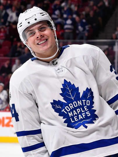 Leafs Mobile: MONTREAL, QC - NOVEMBER 18:  Auston Matthews #34 of the Toronto Maple Leafs smiles after scoring a goal in the third period against the Montreal Canadiens during the NHL game at the Bell Centre on November 18, 2017 in Montreal, Quebec, Canada.  The Toronto Maple Leafs defeated the Montreal Canadiens 6-0.  (Photo by Minas Panagiotakis/Getty Images) Matthew Knies, Hockey Decor, Auston Matthews, Toronto Maple Leafs Hockey, Maple Leafs Hockey, Toronto Photography, Hot Hockey Players, Ice Hockey Players, Nhl Games