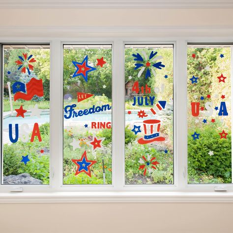 "Find the Double-Sided Patriotic Celebration Gel Window Cling Set at Michaels. com. Be the most patriotic house on the block with these 4th of July window clings. Be the most patriotic house on the block with these 4th of July window clings. With 6 different designs you can decorate to your heart's content. Details: Red, white, and blue 12\" 6 window clings Reusable Double-sided Easy peel and stick application Simply wash in warm soapy water for cleaning Thermoplastic rubber Recommended for indo Lettering Easy, Painted Window Art, Changing Table Pad, Outdoor Bar Sets, Boat Wall, Nursery Chair, Outdoor Bar Table, Window Cling, Buffet Display