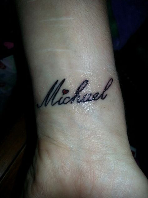 My husband's name Michael Tattoo. On my wrist. Micheal Tattoo Name, Michael Name Tattoo Design, Mike Name Tattoo Design, Michael Tattoo Name Fonts, Small Boyfriend Name Tattoos For Women, Tattoo Name On Wrist, Michael Name Tattoo, Michael Tattoo Name, Husbands Name Tattoo Ideas For Wife