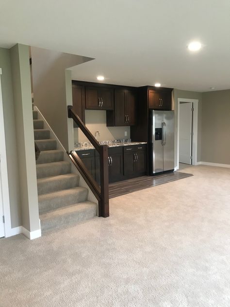 Guest Suite Basement, Mini Kitchen Basement Ideas, Small Basement Furniture Layout, 800 Sq Ft Basement Ideas, Basement Half Kitchen Ideas, Basement In Law Suite Ideas, Finished Basement Kitchenette, Basement Studio Apartment Ideas, Basement Kitchenette With Fridge