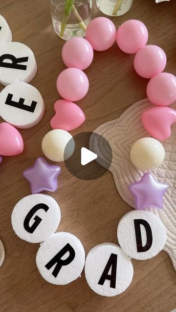 Deborah Trette on Instagram: "friendship bracelet leis for graduation! 🎓 these are SO CUTE! I’ve loved the Taylor Swift garland diys, seriously so clever! 

These were very easy to make and perfect for your littles! I simply thread ball pit shapes and 3in foam discs using an upholstery needle and fishing line! 

save and share! all links under bio!

#diy #diylei #friendshipbraceletdiy #friendshipbracelets #taylorswift #graduation #momlife #momsofinstagram #easycraft #craftidea #diymom #taylorswift" Friendship Bracelet Graduation Lei, Friendship Bracelet Lei, Garland For Graduation, Leis For Graduation, Candy Leis, Candy Lei, Ball Pit Balls, Diy Friendship Bracelet, Graduation Leis