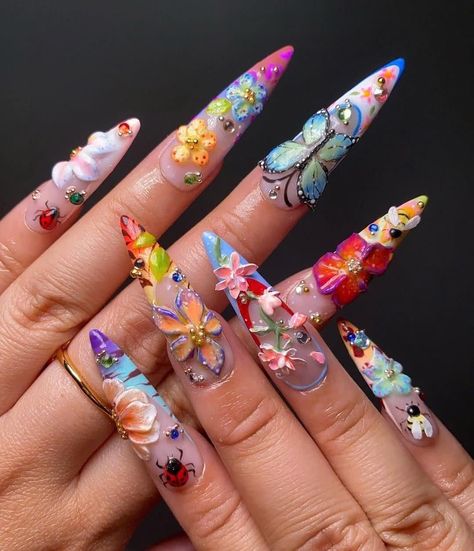 🌸 Floral Fantasy Garden - 3D Butterfly & Bloom Press-On Nails 🦋💐 Step into a vibrant world of color and nature with our Floral Fantasy Garden Press-On Nails. This extraordinary set is designed for those who love to stand out with bold, intricate nail art that captures the essence of a blooming garden. 🎨 Nature-Inspired Masterpieces: 3D Floral Accents: Each nail is adorned with stunning 3D flowers, handcrafted to perfection. From delicate blossoms to vibrant blooms, these nails bring a touch Garden Acrylic Nails, Tanya Core, Nails Vibrant, Nails Styles, Statement Nail, Nail Tutorial, Baddie Nails, Floral Nail, Floral Nail Art