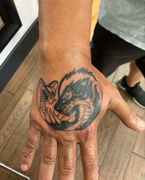 Honey badger and snake hand tattoo, in black and grey. Badger Tattoo Design, Chargers Tattoo, American Traditional Badger Tattoo, Honey Badger Tattoo Design, Snake Hand Tattoo, Hufflepuff Badger Tattoo, Honey Badger Tattoo, Honey Badger Aesthetic, Badger Tattoo