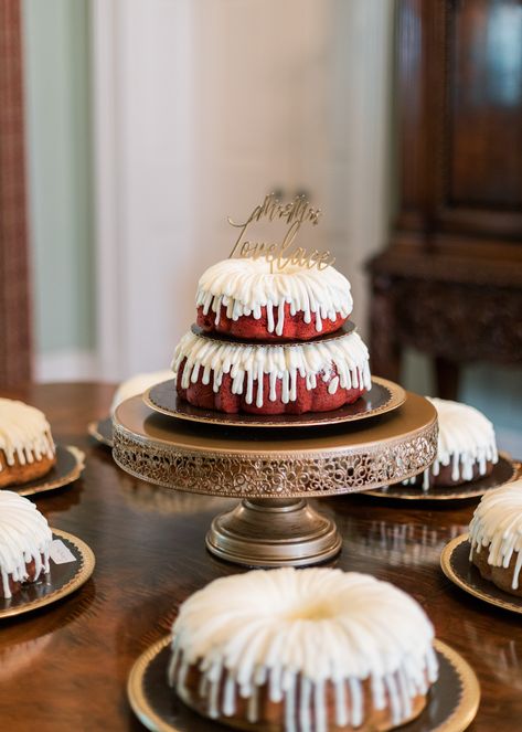 Fun wedding cake trend, this two-tier Nothing Bundt Cake with a custom script wedding cake topper is perfect for brides looking for alternative wedding cake options. This modern and minimalistic wedding cake design is simple and affordable. Check out more from the Lovelace wedding. Stacked Bundt Cake Wedding, Bundt Wedding Cake, Tiered Bundt Wedding Cake, Alternative Wedding Cake Ideas, Minimalistic Wedding Cake, Red Velvet Wedding Cake 2 Tier, Fun Wedding Cake, Alternative Wedding Cakes, Wedding Cake Options