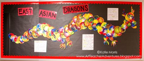 Adventures of an Art Teacher: Dragon Bulletin Board China Bulletin Board Ideas, Dragon Bulletin Board, Color Wheel Project, Bulletin Boards Ideas, Collaborative Art Projects For Kids, Pta Board, Color Wheel Projects, China Study, Kindergarten Art Lessons