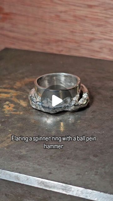 Richard Chown on Instagram: "This is one of the super chunky wrought spinner rings being flared to hold the spinning section in place. The rounded end of a ball pein is rested in the side of the ring and the flat side is hit with a mallet to force the edge of the band out. #spinnerring #silversmithing #hammering" Spinner Rings Tutorial, Chunky Silver Rings, Silver Spinner Rings, Chunky Rings, Super Chunky, Spinner Ring, Spinner Rings, The Band, The Edge