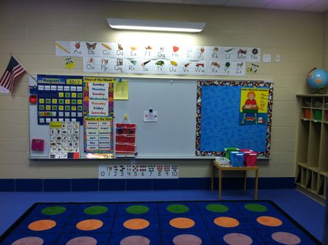 I don't use the whiteboard much in kindergarten so I made my own extra bulletin board by using heavy duty magnets from lowes to hold fabric to the board and I hot glued boarder onto the magnets. Board Classroom, Beginning Of Year, Magnetic White Board, Teacher Things, Spanish Classroom, Pinterest Projects, Special Education Classroom, Cork Board, Board Ideas