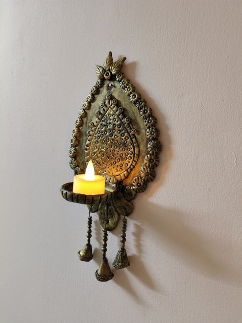 Indian Candle Holder, Clay Art Wall Decor, Clay Candle Holders, Wall Candle Holder, Wall Mounted Candle Holders, Diya Decoration, Front Wall Design, Colorful Room Decor, Coil Pottery