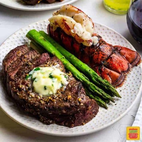 You need to try this surf and turf recipe! Air fried steak with luscious fried lobster tails topped off with herby garlic butter sauce makes an unforgettable dinner. Beautifully seasoned and perfectly cooked steak with buttery lobster tails is SO easy to make in the air fryer! #SundaySupper #airfryer #airfryerrecipes #steak #lobster #surfandturf #seafood #seafoodrecipes #steakrecipes #beef #easyrecipes #valentinesday Air Fried Steak, Mixed Seafood Recipe, Ways To Cook Steak, Steak Dinner Recipes, Fried Lobster, Steak And Lobster, Fried Steak Recipes, Mignon Steak, Filet Mignon Steak