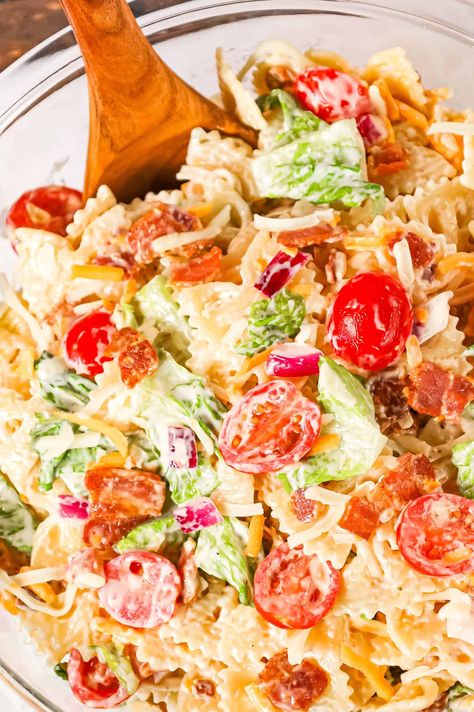 BLT Pasta Salad is a delicious cold side dish recipe made with bowtie pasta and loaded with chopped bacon, grape tomatoes, red onions and shredded cheese. Bacon Pasta Salad, Blt Pasta Salad, Tomato Pasta Salad, Bacon Ranch Pasta Salad, Classic Pasta Salad, Creamy Pasta Salads, Carrot Salad Recipes, Chicken Caesar Pasta Salad, Blt Pasta