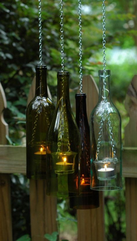 Hanging DIY Glass Bottle Ideas Wine Bottle Lanterns, Bottle Plant, Wine Bottle Wind Chimes, Old Wine Bottles, Outdoor Lighting Design, Diy Outdoor Lighting, Plants In Bottles, Christmas House Lights, Lantern Ideas