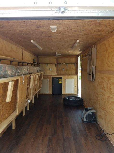 Hunting camp cargo conversion with toy storage. Toyhauler Remodel, Enclosed Trailer Ideas, Enclosed Trailer Cabinets, Van Camper Conversion, Trailer Shelving, Utility Trailer Camper, Hunting Trailer, Cargo Camper, Enclosed Trailer Camper