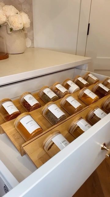 Muna | Home Decor | Cleaning | Organizing on Instagram: "Spice Jar Drawer! Comment “SPICE” for the links to these jars, labels, and organizers to be directly sent to you. SAVE THIS FOR INSPO 💕 #spices #organization #organize #organized #organizedhome #kitchenorganization #organizer #drawer #homeideas #homeorganization #kitchendecor #homeinspiration #homeinspo #housegoals #minimalist #modernhome #ltkhome #amazonfinds" Spice Jar Drawer, Seasoning Organization, Spice Jar Organization, Spices Organization, Jar Organization, Basement Kitchen, Spice Jar, First Apartment, Home Lifestyle