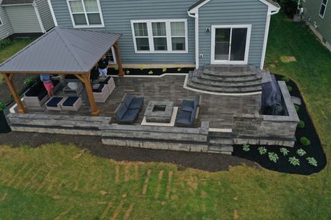 Backyard Patio Simple, Deck Around Corner Of House, Patio Paver Designs Layout, Cozy Yard, Patio Lighting Ideas, Stone Patios, Paver Patios, Patio Remodel, Backyard Layout