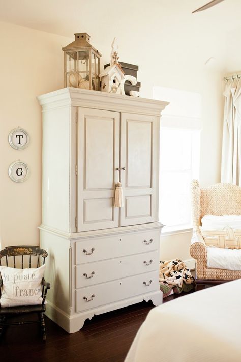 Armoir Decor Top Of Bedroom, Armoire In Hallway, How To Decorate Top Of Armoire In Bedroom, On Top Of Wardrobe Decor, Wardrobe Top Decor, Decor For Top Of Armoire, Top Of Armoire Decor Bedroom, Armoire Bedroom Ideas, Armoire Decor Top Of