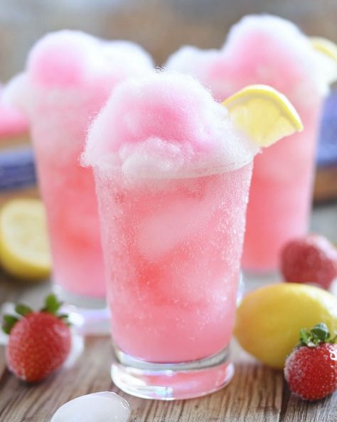 1.5 oz Vodka, 1 oz Blue Curacao, 1 oz Lemonade, 1 oz Club Soda, Cotton Candy for topping, Maraschino Cherry for garnish  Are you ready to indulge in nostalgia? Give this dreamy cocktail a try and let the sweet memories flow! #CottonCandyCrush #SipSipHooray Mocktails Cotton Candy, Cocktail Recipes Cotton Candy, Cotton Candy Champagne Cocktail, Pink Drink With Cotton Candy, Cotton Candy Cocktail Vodka, Pink Candy Floss, Cotton Candy Cocktail, Sip Sip Hooray, Candy Floss