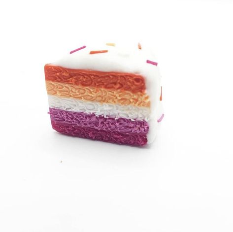 Credit:firefoxcutecreations Lesbian Cake, Stack Necklaces, Lesbian Necklace, Pride Cake, Pride Jewelry, Flag Cake, Earrings Food, Pie Slice, Pride Jewellery