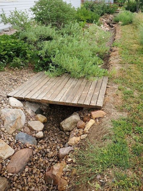 Creating a Dry Creek Bed — Our Nesting Space Yard Bridges Backyards, Dry Creek Bridge, Creek Bridge Diy, Diy Backyard Creek, Backyard Creek Ideas, Large Side Yard Landscaping, Lake Landscaping Ideas, Creek Bridge Ideas, Swale Landscaping Ideas