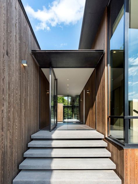 Love the pivot hing front door and floating concrete steps. Modern Concrete Steps Entrance, Modern Concrete Stairs Outdoor, Floating Entrance Steps, Floating Concrete Steps Front Door, Steps At Front Door Entrance, Modern Front Door Steps, Floating Front Steps, Modern Front Steps Entrance, Front Door Steps Ideas Entrance Modern