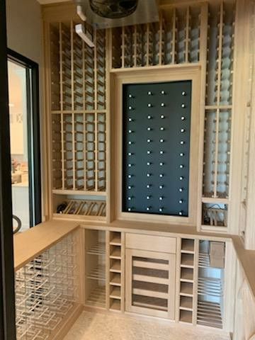 White oak wood with wine pins and clear Plexiglas shelves and humidor. Wall White, White Oak Wood, Wine Rack Wall, Wine Cellars, Humidor, Wine Room, Wine Cellar, Entertainment Unit, Bars For Home