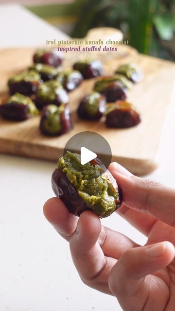 shivangi pithisaria on Instagram: "the viral kunafa chocolate inspired stuffed dates 🍫

1 cup sevaiya

- toast till golden brown

1/2 cup pistachio 

- toast on low heat for a few minutes till aromatic 
- let cool for a few and blend while still warm
- keep pulsing till oil releases and you’re left with a thick butter

1/2 a can condensed milk (around 100g)

- blend with pistachios till it solidifies into a fudge 
- mix the fudge with the toasted sevaiya

pitted dates
dark chocolate melted with coconut oil
white chocolate melted with coconut oil
rose petals
pinch of salt 

- deseed the dates 
- add the gooey filling
- coat with dark chocolate 
- top with white chocolate or rose petals
- finish with a pinch of salt
- refrigerate till chocolate harden and serve ✨" Date And Pistachio Bites, Pistachio Toast, Kunafa Chocolate, Pitted Dates, Stuffed Dates, Creative Dates, Date Recipes, Chocolate Topping, Chocolate Coating