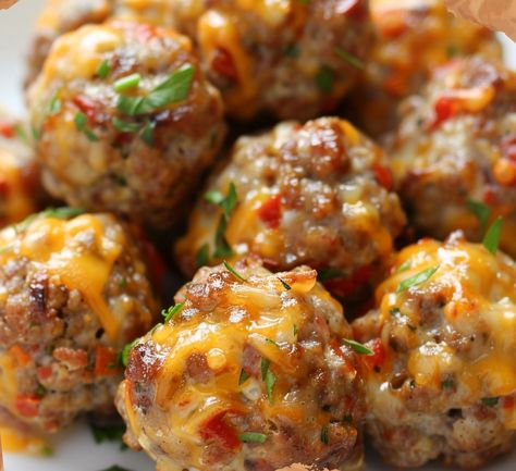 Treat your taste buds to a crowd-pleasing appetizer with these irresistible Rotel Cream Cheese Sausage Balls. Perfect for parties, game days, or any gathering, these savory bites are loaded with flavor and guaranteed to disappear fast. To make these delicious sausage balls, start by preheating your oven to 375°F (190°C) and lining a baking sheet... Rotel Cheese Sausage Balls, Brunch Meat Appetizers, Ranch Sausage Balls, Royal Cream Cheese Sausage Balls, Sausage Balls With Rotel, Rotes Cream Cheese Sausage Balls, Cream Cheese Rotel Sausage Balls, Hotel Cream Cheese Sausage Balls, Italian Sausage Appetizer Recipes