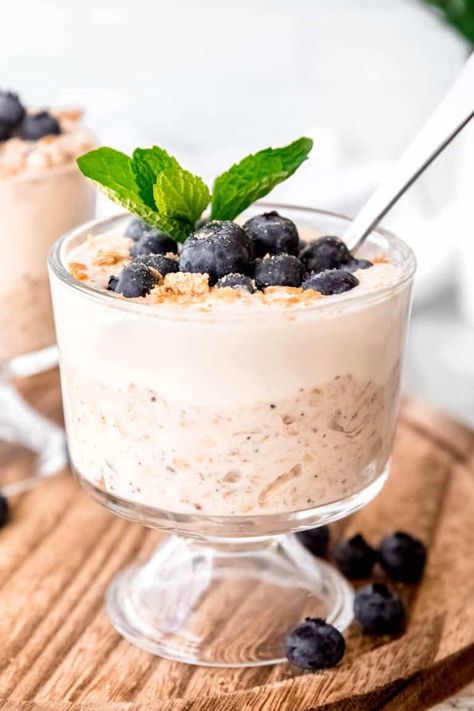 Indulge in a guilt-free breakfast with our High-Protein Berry Cheesecake Overnight Oats—no protein powder needed! This delightful recipe swaps cream cheese for a low-fat blend of cottage cheese and yogurt. Enjoy the decadent flavor of cheesecake combined with the nutrition of hearty oats and fresh berries. With just 10 ingredients and no added allergens, it's simple, nutritious, under 320 calories, & 20 grams of protein per serving. Perfect for a meal-prep friendly, energizing start to your ... Overnight Oats No Protein Powder, Cottage Cheese And Yogurt, Cheesecake Overnight Oats, 20 Grams Of Protein, Starbucks Egg Bites, Protein Overnight Oats, Food Justice, Brunch Bread, Instant Oats