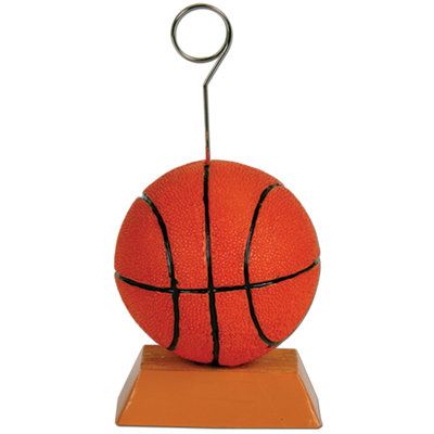 Decorate your sports themed party with this Basketball Photo Holder Picture Frame. | The Party Aisle™ Basketball Photo Holder Picture Frame Ceramic in Brown/Orange, Size 5.0 H x 2.5 W x 2.5 D in | Wayfair Basketball Banquet, Hanging Balloons, Basketball Theme Party, Basketball Decorations, Sports Banquet, Balloon Holders, Basketball Birthday Parties, Banquet Ideas, Ball Birthday Parties