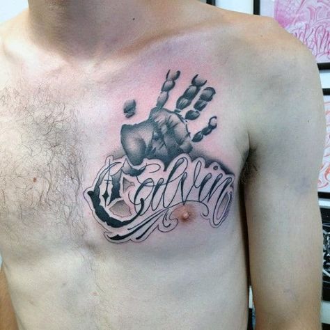 30+ Kids Names Tattoo Ideas: Cute and Sweet - Saved Tattoo Handprint Tattoo, Hand Print Tattoos, Baby Footprint Tattoo, Tattoo On Chest, Tattoo Artists Near Me, Kid Name Tattoo, Heartbeat Tattoo, Family Tattoo Designs, Saved Tattoo