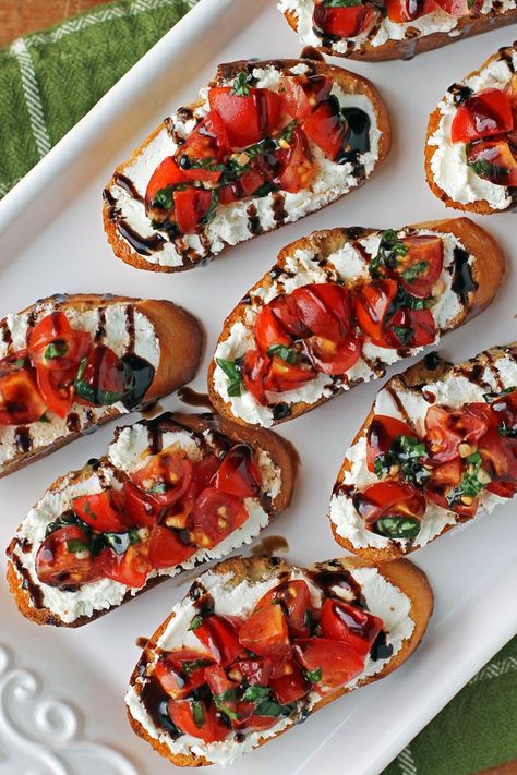 This Tomato and Goat Cheese Bruschetta pairs fresh tomato and basil with creamy goat cheese, crusty French bread, and tangy balsamic glaze! Tomato Bruschetta With Balsamic Glaze, Bruchetta Bread, Wine Night Food, Wine Night Snacks, Healthy Bruschetta, Goat Cheese Bruschetta, Tomato Crostini, Tomato Balsamic, Tomato And Goat Cheese