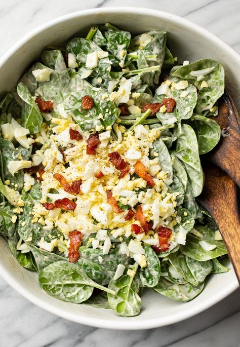 This quick and simple spinach salad recipe has a vibrant creamy dressing and loads of crispy bacon! It's a delicious salad anytime of the year. Spinach Lettuce Salad, Spinach Romaine Salad, Spinach Salad With Balsamic Dressing, Salads And Sides, Veggies With Bacon, Classic Spinach Salad, Romaine And Spinach Salad, Cesar Salad With Spinach, Joanna Gaines Spinach Salad