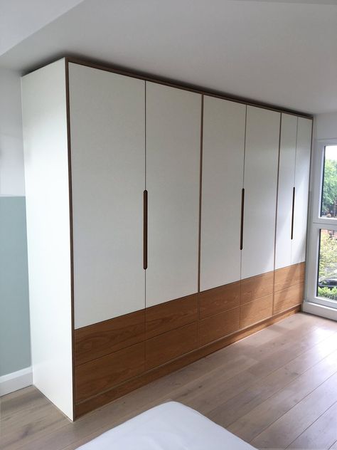 Wardrobe With Bottom Drawers, White And Wooden Wardrobe Design, Cupboard Plywood Design, White Laminate Wardrobe Design, White And Wooden Wardrobe, Plywood Wardrobe Design, Laminated Wardrobe Design, Shutter Wardrobe Designs, Wardrobe With Drawers Below