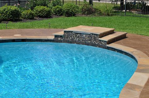 Diving platform for the kiddos with a sheer descent. Jumping Platform For Pool, Pool Diving Platform, Diy Swim Platform, Pool Jumping Platform, Pondless Water Feature, Diving Platform, Pool Concrete, Rock Boulder, Pools Inground