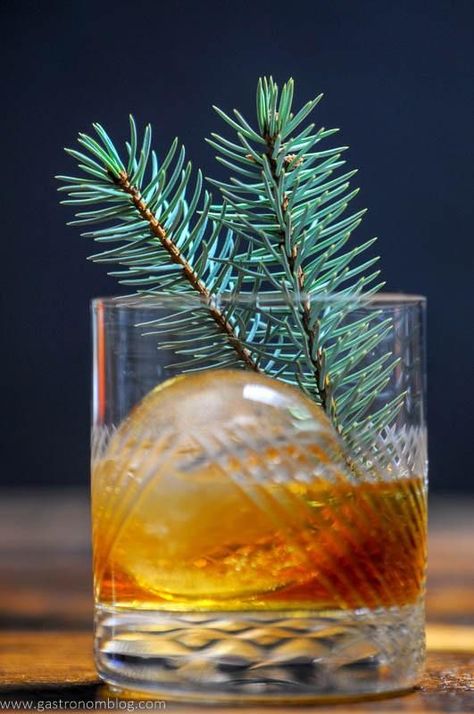 A close up shot of a Pine Old Fashioned Cocktail in a crystal rocks glass on a wooden bar top.  TRY using Clear Creek Doug Fir Brandy rinse? Pine Syrup, Mixology Cocktails, Painkiller Cocktail, Bourbon Old Fashioned, Maple Whiskey, Whiskey Business, Reception Cocktail, Rosemary Syrup, Crystal Rocks