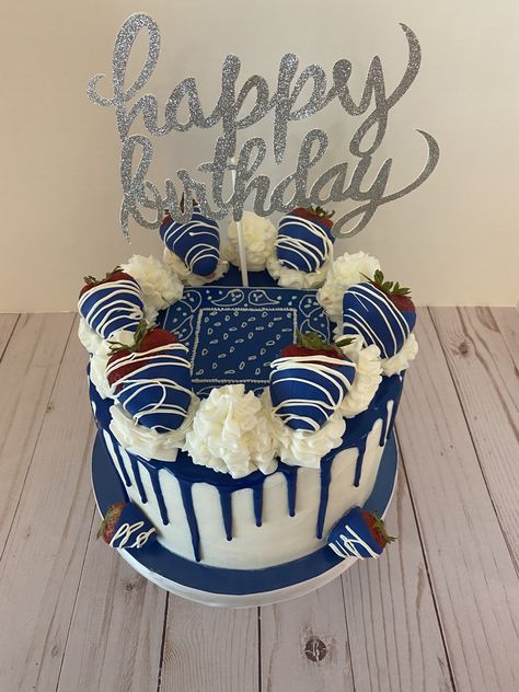 This Royal blue drip cake was created with the “Chelsweets” white chocolate ganache recipe and chocolate covered strawberries. Blue And White Drip Cake For Men, Blue Themed Cake For Men, Royal Blue And Silver Cake For Men, Strawberry Birthday Cake For Man, Blue Birthday Cakes Men, Blue And White Drip Cake, Navy Blue And Silver Birthday Cake, Blue Strawberry Cake, Blue Cake With Chocolate Drip