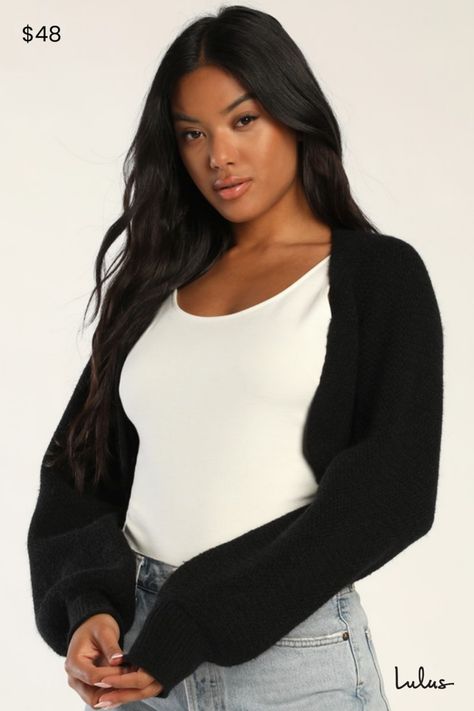 Sweater season just got better now that we've got the Lulus Warm Comfort Black Long Sleeve Open-Front Shrug Sweater! This open-front shrug-style cardigan sweater has long balloon sleeves (with fitted cuffs) and an ultra-cropped hem that layers well over casual tanks and tees or flirty night-out dresses to keep you cozy all season long! Fit: This garment fits true to size. Length: Size medium measures 13.5" from shoulder to hem. Bust: Great for any cup size. Fabric: Fabric is very stretchy. Unlined. 45% Acrylic, 30% Polyamide, 25% Polyester. Hand Wash Cold. Do Not Bleach. Line Dry. Iron Low Heat. Imported. Lulus | Warm Comfort Black Long Sleeve Open-Front Shrug Sweater. Black Shrug Outfit, Shrug Outfit, Shrug Style, Black Cropped Cardigan, Black Shrug, Knit Shrug, Sweater Season, Lulu Fashion, Casual Tanks