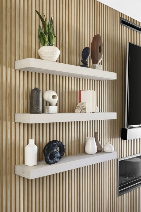 Fluted Wall With Shelves, Floating Wall Panels, Wood Slat Wall With Floating Shelves, Wall Panelling With Shelves, Shelves On Slat Wall, Living Room Cladding Wall, Slat Wall Floating Shelves, Wall Slats With Shelves, Wood Wall Slats Interiors