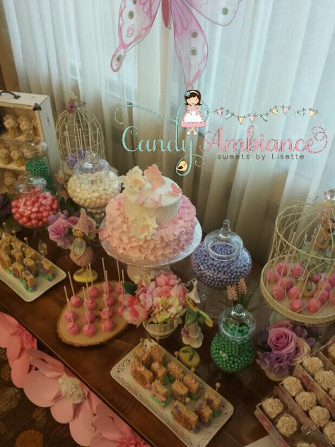 Fairy baby shower dessert candy table Fairy Candy Table, Fairy Themed Dessert Table, Fairy Party Candy Table, Fairy Candy Bar, Fairy Birthday Cake Table, Fairy Birthday Party Decorations Enchanted Garden Dessert Tables, Dessert Table Signs Birthday Fairy, Fairy Baby Showers, Baby Shower Dessert Table