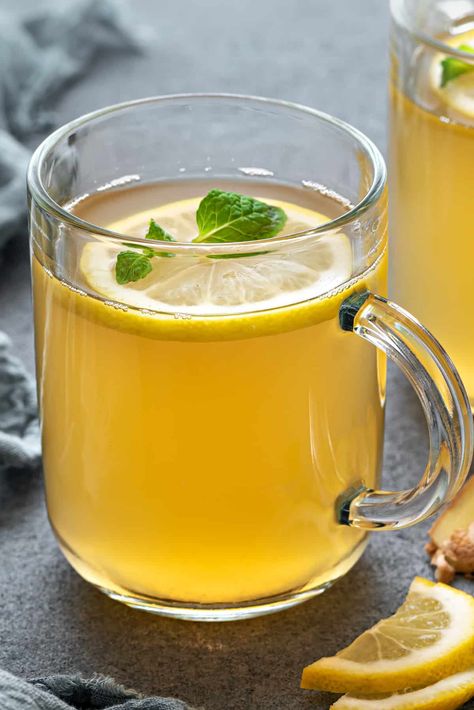 The Best Lemon Ginger Tea Recipe - Lemon ginger tea is comforting, nourishing, and delicious. Enjoy a warm mug to soothe a winter cold or cough, or as a bright and flavorful drink any time of the year. This healthy recipe is easy to make without teabags; you only need a few wholesome ingredients and less than 10 minutes! | Cubes N Juliennes Throat Tea, Homemade Spring Rolls, Lemon Ginger Tea, Tea With Honey, Ginger Lemon Tea, Sore Throat Tea, Ginger Tea Recipe, Spring Roll Wrappers, Lemon Diet