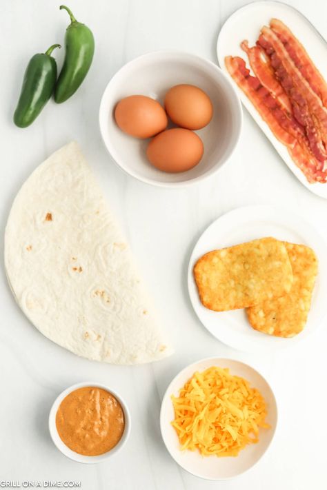 Taco Bell Breakfast Crunchwrap Recipe - Eating on a Dime Taco Bell Breakfast Crunch Wrap Sauce, Taco Bell Quesarito Recipe, Taco Bell Breakfast, Crunchwrap Recipe, Breakfast Crunchwrap, Hash Brown Patties, Taco Bell Recipes, Crunch Wrap, Creamy Jalapeno